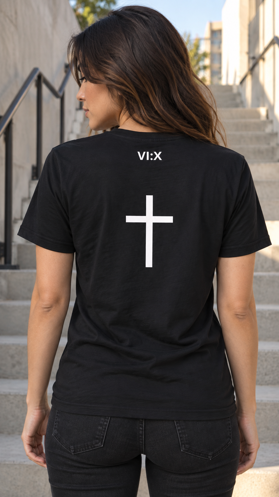 Armor of God Cross-Back Jersey T-Shirt, female model wearing the back with VI X cross graphic in Los Angeles