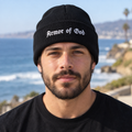Armor of God Cuffed Beanie, male model wearing the embroidered front in Los Angeles