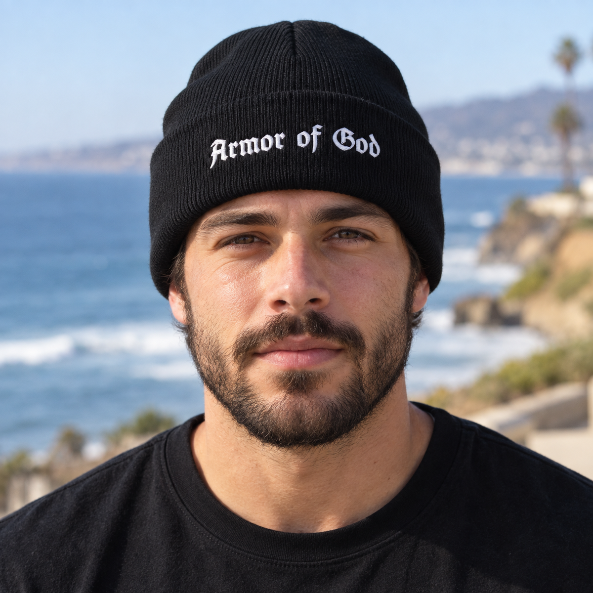 Armor of God Cuffed Beanie, male model wearing the embroidered front in Los Angeles