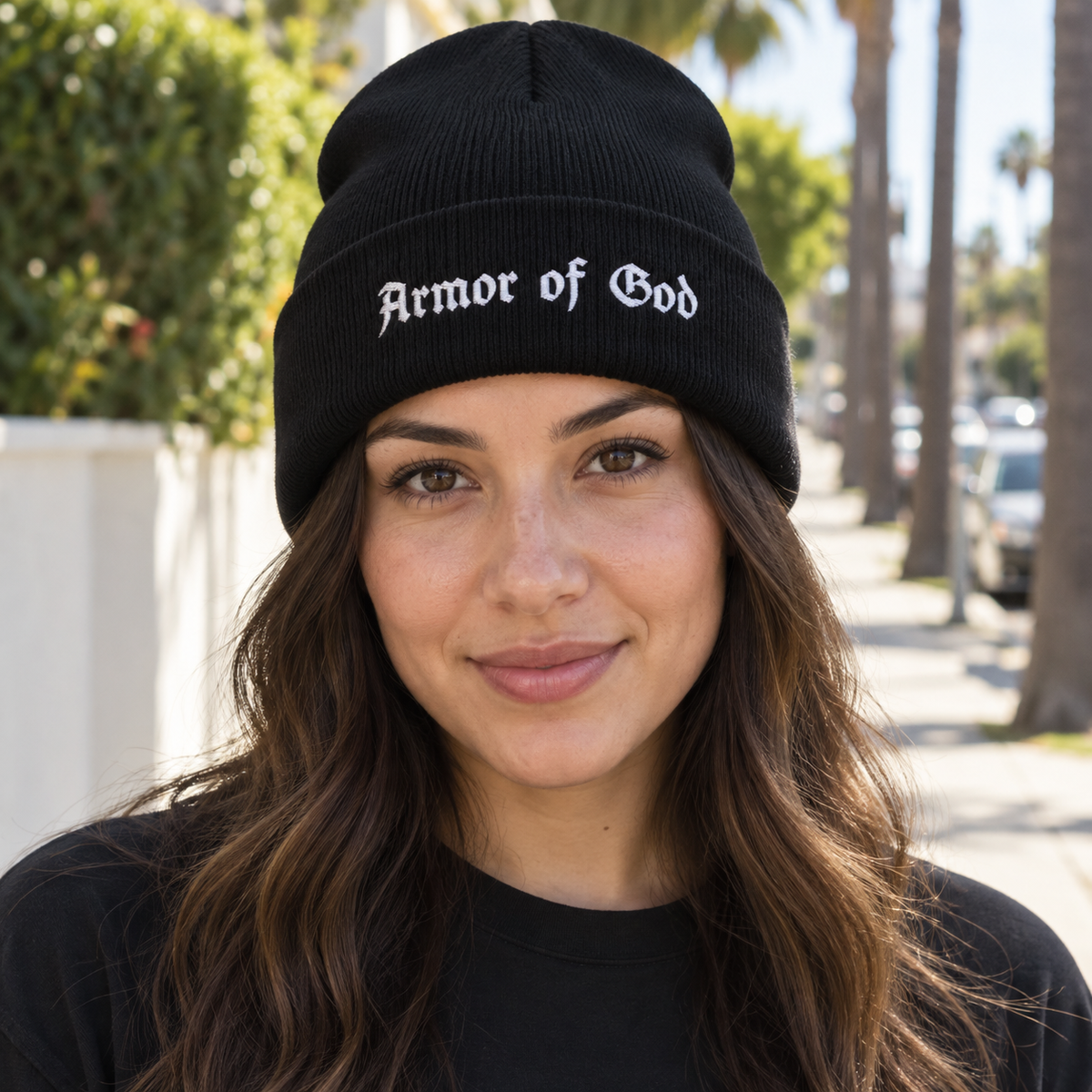 Armor of God Cuffed Beanie, female model wearing the embroidered front in Los Angeles