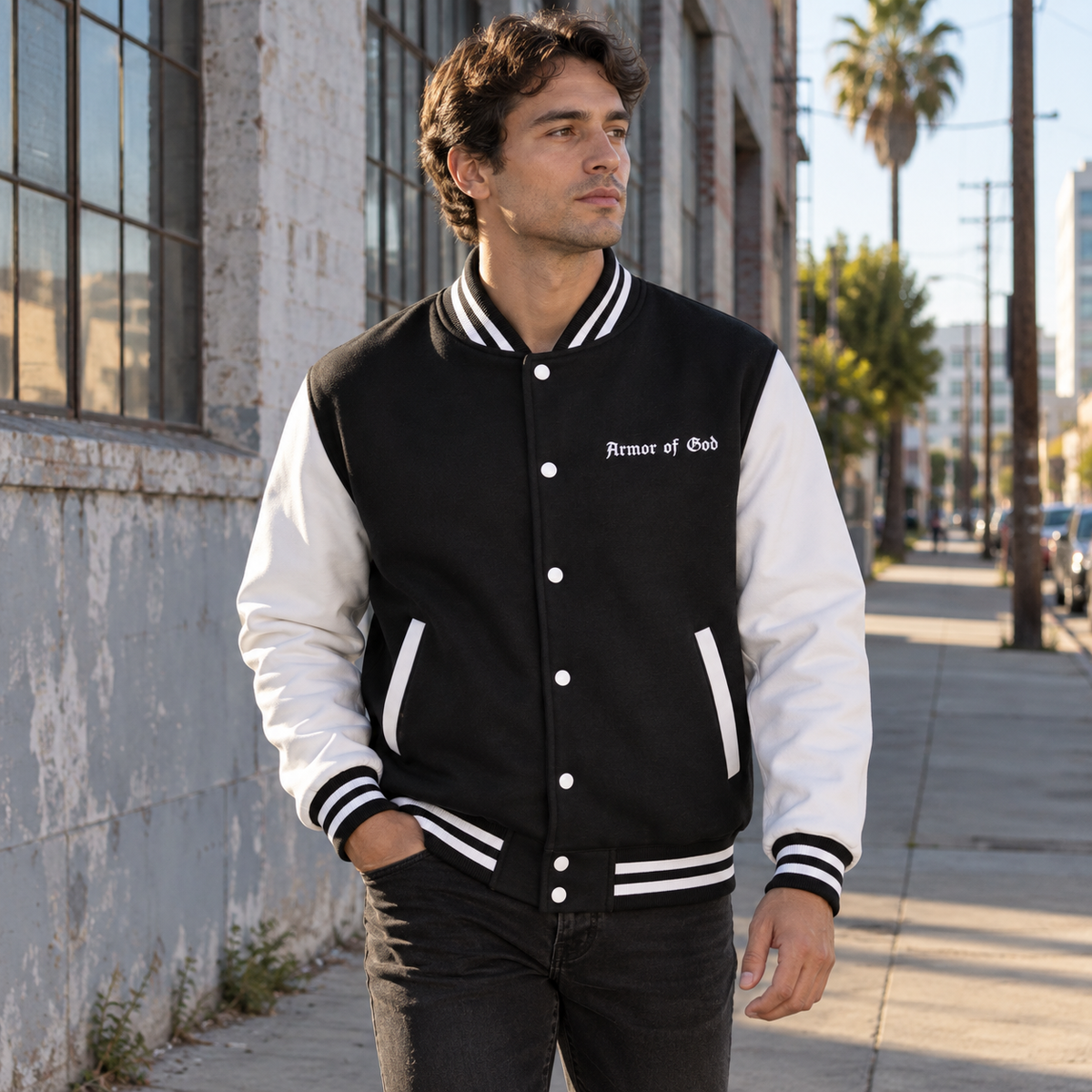 Armor of God Letterman Jacket, male model wearing the front in Los Angeles