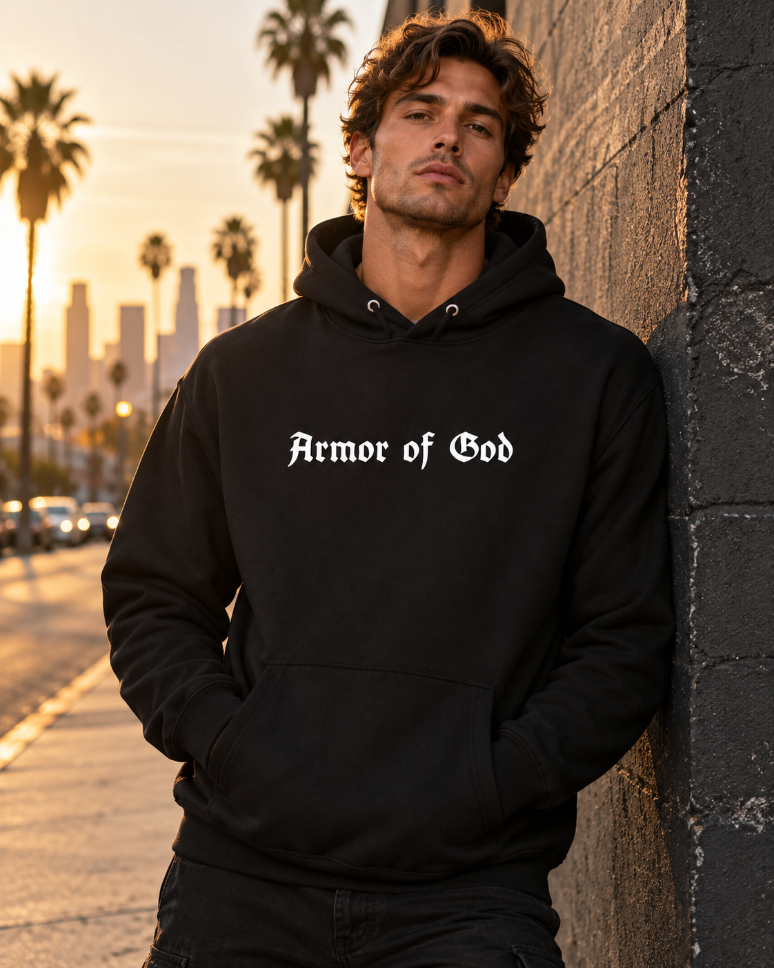 Male model wearing the Armor of God Pullover Hoodie front in Los Angeles