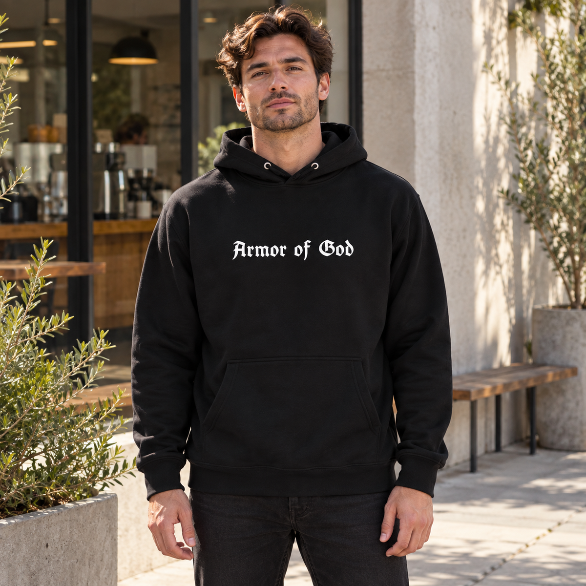 Armor of God Pullover Hoodie, male model wearing the front in Los Angeles